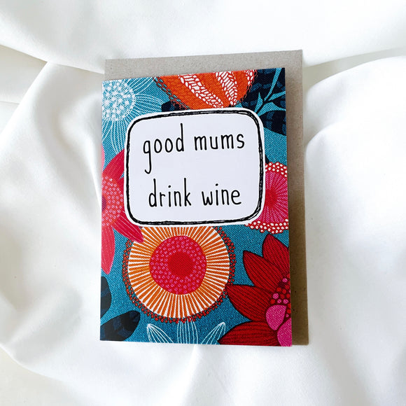 greeting card . good mums drink wine . red flowers .
