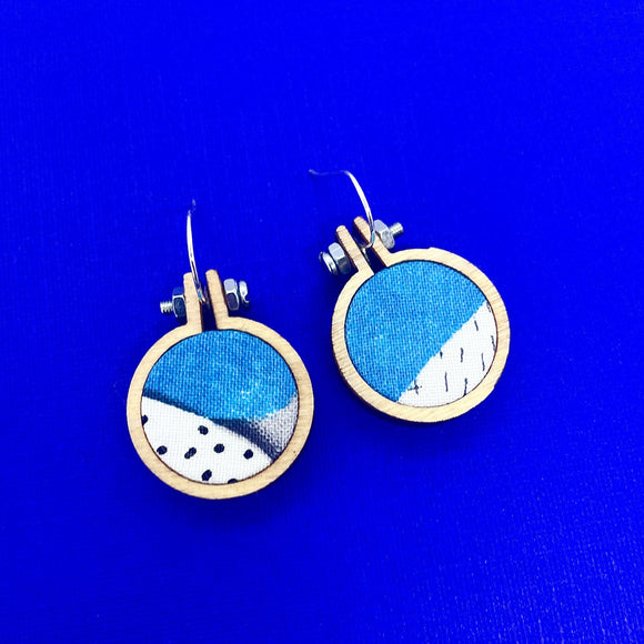 mini hoop earrings . blue sky .